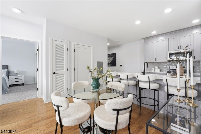 Discover Liberty Place - Bloomfield?s newest boutique condo community. Now selling our penthouse level. Residence 402 is filled with natural light and showcases solid oak floors, 9? ceilings, quartz countertops, GE appliances, in-unit washer/dryer, tankless hot water heater, nest thermostat, and primary bath with dual sinks. One deeded parking space available for purchase and can be included in the mortgage. Building amenities include a rooftop deck, wellness gym with NordicTrack equipment, and bike storage. HOA covers water, landscaping and snow removal, garbage and recycling, master insurance, common area maintenance, and building reserves. Located in Bloomfield at the border of Montclair and Glen Ridge, you are in the center of it all! Amazing central location close to restaurants, shopping, parks and entertainment and just a quick 35 minute train ride to NYC. 5-year tax abatement. 10-year New Construction Warranty. Pets allowed.