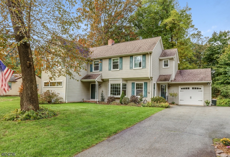 Warm and inviting 5 bedroom colonial situated on a cul-de-sac street in sought after neighborhood. This attractive home offers 2 bedrooms on the first floor with a new full bath with walk in shower. Sun filled formal dining room with sliders that open to composite deck is perfect for outdoor entertaining. Eat-in kitchen with new counters and back-splash. Large en-suite master bedroom with soaking tub and separate shower. Lush landscaped private backyard. Extensive renovation in 2001/2002 including entire second level, first floor dining room addition and new sheet-rock throughout. Very close proximity to Intervale Elementary. Parsippany named one of the only 2 NJ towns as best places to live by Money Magazine!