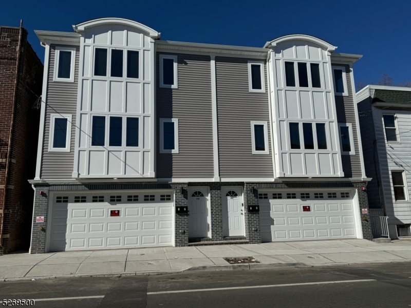 A stunning newly constructed multi-family property in the heart of Newark, offering the perfect blend of modern design, functionality, and income potential. This 2024-built, three-story residence is ideal for both owner-occupants and savvy investors seeking immediate returns. This exceptional property features 2 spacious units, each thoughtfully designed with today's lifestyle in mind. The home offers a total of 6 bedrooms, 4 full baths, and 1 half bath, with beautifully appointed interiors that include open-concept living and dining areas, modern kitchens with stainless steel appliances, and in-unit laundry for added convenience. Each unit boasts generous bedroom sizes, including a primary suite, ample storage, and contemporary finishes throughout, creating a comfortable and stylish living experience. The 1st floor unit includes a fully finished walkout basement, offering additional flexible space perfect for storage, recreation, or future possibilities. Exterior features enhance both curb appeal and functionality, including a private fenced rear yard, patio space, and a built-in garage, a rare find in this area. With separate utilities, central air, and energy-efficient systems, this property is designed for ease of ownership and long-term value. Current rental potential provides strong income, making this a true turnkey investment opportunity.  Located near major transportation, shopping, and local amenities in one of Newark's evolving neighborhoods.
