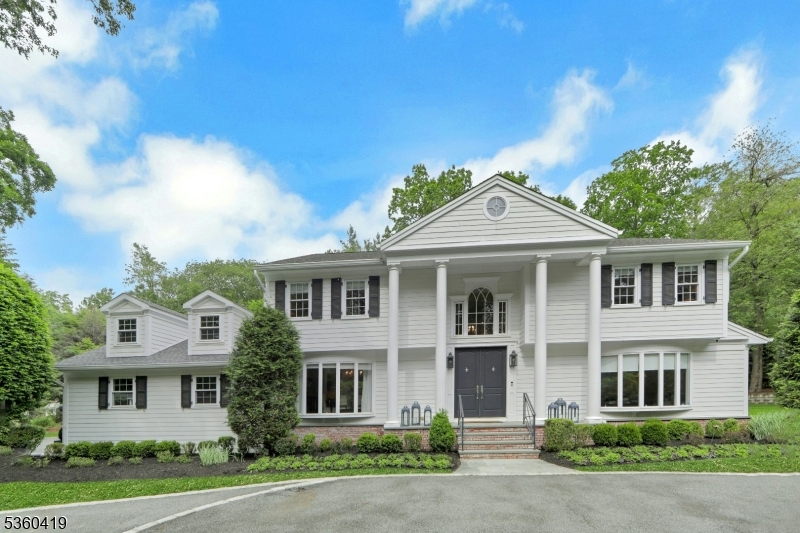 This home isn't just about luxury it's about the experience! Newly transformed Colonial featuring  5 BR, 4 BTH situated  in a quiet cul de sac in prestigious Franklin Lakes. This residence is part of a community known for its tranquility suitable for all. This redesigned home features an welcoming  expansive  2ST EF highlighting the custom staircase & hand forged  railing.This residence seamlessly blends transitional updates with timeless elegance, offering an extraordinary  living experience for todays buyers. The heart of the house,an updated top of the line designer kitchen,serves as a culinary haven and the social epicenter equipped with Calcutta marble and top of the line  appliances. With an open layout that seamlessly flows this space is perfect for lage scale entertaining.Custom glass sliding doors open onto the expansive bluestone patio, inviting the beauty of the outdoors in,  revealing a sprawling backyard, perfect for relaxation, outdoor dining, and play. A private first floor bedroom/office checks the box for all who work from home! The Owner's Suite offers a tranquil and luxurious ambiance,complemented by its LUXE spa like bathroom. Three BDRMS &  updated FBTH complete this level.The finished LL offers multi functional spaces perfect for rec room, gym & FBTH.An extensive list of upgrades, both indoors and outdoors, has transformed this residence into a turnkey masterpiece!Close proximity to the highly rated elementary school & NYC transportation.