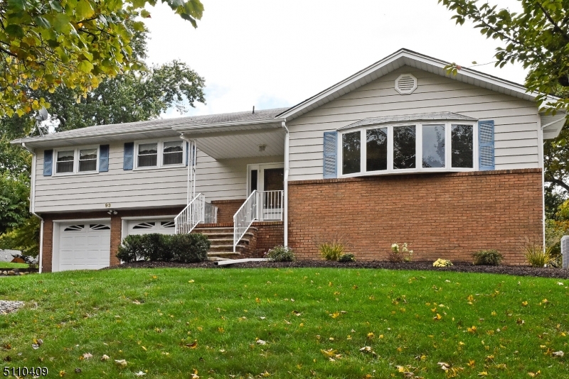 Welcome to 93 Brooklawn Dr. This 3 bed 2 1/2 bath meticulously kept home has a lot to offer. Hardwood floors throughout, updated kitchen with Italian porcelain tile and granite counter tops. Formal living room with 4 season room. Formal living room with new  Pella bay window. Master bedroom with full bathroom. Lower level with Family room that leads to expansive backyard and patio. Basement has additional storage and a 2 car garage. Close to major highways. 287, 80, 53, 10 and public transportation. This home is not to be missed.
