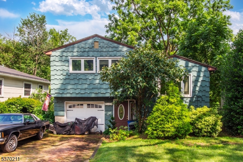 Split Level Home in the heart of Downtown Denville! Hardwood floors throughout. Functional eat in kitchen. Opens to a cozy, yet bright Living Room. Upstairs, a full bath & 3 nice-sized bdrms, generous closet space in each. Downstairs, family room and walkout to backyard. Outside, an enchanting oasis & great entertaining space w/deck. Enjoy the Privacy on the Rockaway River, situated just a short walk to DWTN Denville- offering restaurants, pubs, shops & boutiques. Direct access to NYC from either train to Penn Station or bus to Port Authority. Plenty of parking on & off st+ 1 car garage.