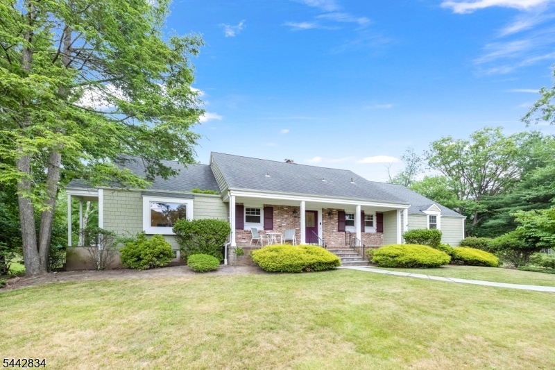 Welcome to 354 Central Ave in the sought-after town of North Caldwell! This beautifully updated and expanded home offers approximately 3,467 square feet of thoughtfully designed living space. The first floor features a spacious primary suite, two additional bedrooms, two full bathrooms, a bright living room, a formal dining room, and a well-appointed eat-in kitchen with stainless steel appliances and abundant cabinet space. The second level offers exceptional versatility with two generously sized home offices that can easily serve as additional bedrooms, along with two more bedrooms and a full bathroom?ideal for remote work, guests, or multigenerational living. The finished walkout basement provides a spacious recreation or family room, a convenient half bathroom, direct access to the attached two-car garage, and walkout access to the expansive backyard, making it perfect for entertaining, relaxing, or everyday living. This home is packed with premium upgrades, including two fireplaces, a water softener, a reverse osmosis drinking water system, four smart thermostats, multi-zone heating and central air conditioning, thermal-efficient windows, an owned solar panel system, EV charging stations, and a whole-house generator, offering exceptional comfort, convenience, and energy efficiency. Situated on a 0.54-acre lot, this remarkable property is conveniently located near parks, houses of worship, shopping, and major transportation routes. This home is a must-see!