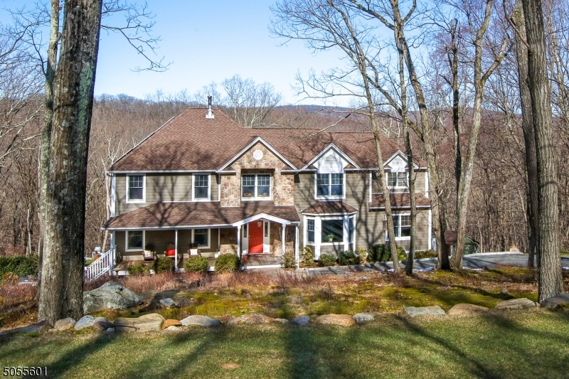 2008 Custom incredibly built colonial open floor plan backing hundreds of acres of parkland, situatated on a cul de sack street. Oversized windows, hardie plank siding with cultured stone exterior. Deck overlooking private yard and an inground pool w/infinity look. Custom h/w floors and woodwork. Beautifully open designed kitchen w/ quartz counters, full tile backsplash and extended bar area. Gaze down hallway to the office and full bath. The second floor with a Master BR w/ tray ceiling, h/w floors, recessed lights, WI closet and MB, large shower double sink vanity with granite. Laundry on second level, plus 3 more good sized bedrooms, plus main bath, double sink and granite.  Lower level walk out finished basement with half bath. Sliding glass doors to back patio and pool, solar for low costs, and owned.