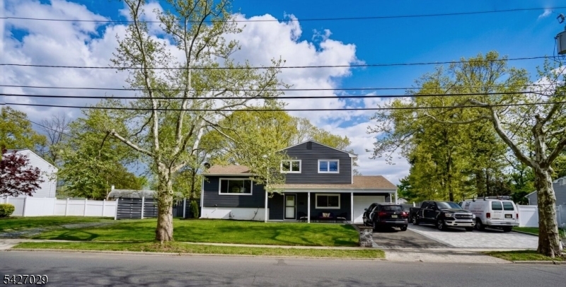 Step into this beautifully renovated split-level home, proudly owned and meticulously transformed by professional contractors whose craftsmanship and attention to detail are evident throughout. Upon entry, the lower level welcomes you with a versatile and functional layout featuring a private home office, a convenient powder room, and an inviting family room with direct access to the backyard, creating effortless indoor-outdoor living. Just off the family room, the garage has been professionally converted into an expansive bonus space, ideal as a playroom, home gym, studio, media room, or additional storage. The beautifully updated kitchen is outfitted with high-end appliances, including a premium Forno range, and offers direct access to the backyard, making indoor-outdoor entertaining a breeze.Step outside and discover an entertainer's dream backyard. Enjoy summer days by the above-ground pool, cozy evenings gathered around the fire pit, and plenty of open yard space for children, pets, and outdoor activities. A storage shed adds even more convenience to this thoughtfully designed outdoor retreat.A true must-see for anyone looking for a move-in-ready home designed for making memories for years to come.More photos will be uploaded soon