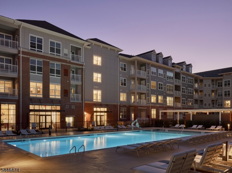 Experience resort-style living at Highgate at Livingston, where contemporary luxury, exceptional amenities, and sophisticated design come together.Thoughtfully designed residences feature spacious open-concept floor plans, designer kitchens with premium finishes, spa-inspired bathrooms, oversizedwindows, and the convenience of in-unit washer and dryers, combining elegance with everyday functionality. Beyond your front door, enjoy an impressivecollection of indoor and outdoor amenities designed to elevate your lifestyle. Unwind in beautifully appointed resident lounges, stay productive in dedicated coworking spaces, or maintain your wellness in the state-of-the-art fitness center with a dedicated yoga studio. Step outside to relax by the resort-style pool with in water loungers and private cabanas, gather around fire pits, entertain at the outdoor kitchen with barbecue grills, or enjoy the beautifully landscaped grounds. Four-legged residents will love the private dog park and pet spa, while EV charging stations provide added everyday convenience. Ideally located in the heart of Livingston, Highgate offers effortless access to premier shopping, dining, major highways, and New York City, delivering the perfect blend of luxury, convenience, and everyday comfort. Welcome to a community where every detail has been thoughtfully curated to elevate your lifestyle.