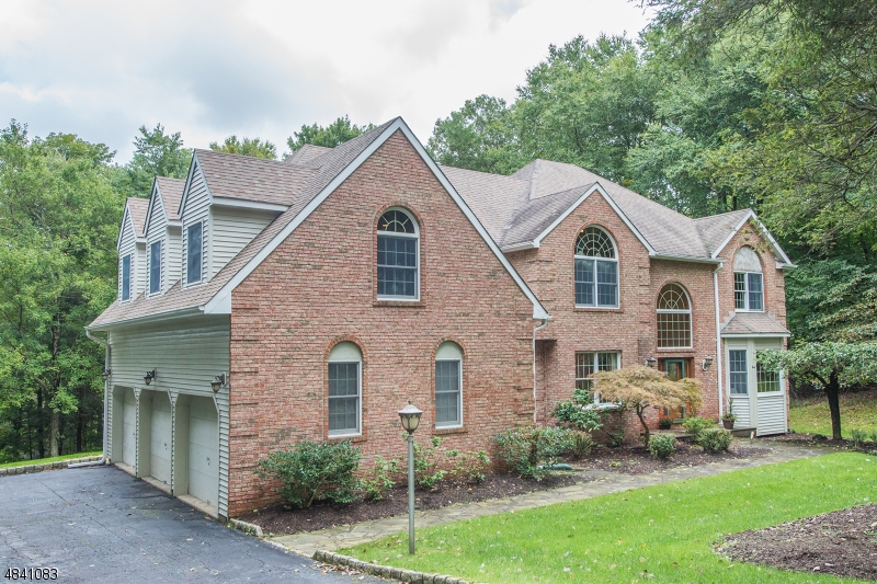 Sunset Lakes expanded brick front Colonial on 1.5+ acres close to town. 1st floor 4 season sun room to inlaw/guest suite & amazing 2 tier composite deck.On grade 3 car garage. The bright  kitchen features granite, SS appliances, 18" tile flooring & gas cook top  it is open to  the family room w/ floor to ceiling FP,  Master suite with sumptuous bath, 2 walk-in closets and vaulted ceiling.   Hardwood floors  on 1st and 2nd story (under carpet per seller)  Back staircase leads to  a bonus multipurpose room.Friendship door to 1st fl laundry and mudroom. Beautiful views.  Anderson windows.  3 zone cooling and 5 zone heating,  radiant heat and CA in 4 season sun room.  Close to  Rt 15, schools & amenities Fish, kayak & Skate @ Sunset Lakes