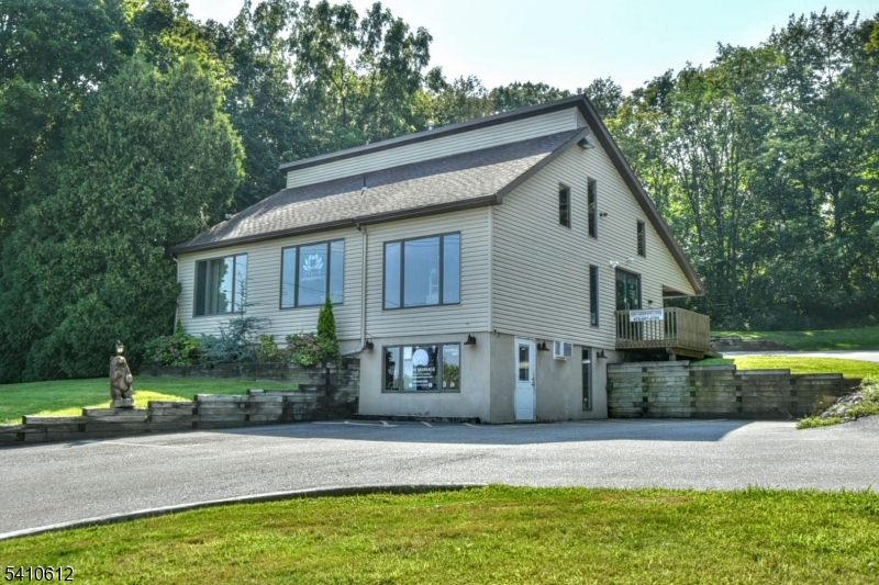 FANTASTIC ROAD TRAFFIC/VISIBILITY! WELCOME TO THE MCAFEE SECTION OF VERNON TOWNSHIP JUST DOWN THE ROAD FROM MTN CREEK SKI RESORT! Three units total in a well cared for building in a peaceful setting! 2 of the 3 units are currently rented , one vacant and listed for rent. Great property for the INVESTOR OR BRING YOUR BUSINESS WHILE COLLECTING RENT! Current tenants are orthodontist/medical and beauty/massage.  The available unit is perfect for medical, retail,  beauty skin care, salons etc. Lots of parking and all 3 units have private bathroom and easy access w/NO STAIRS.  There is an additional vacant space upstairs that can be storage or new owner can look into turning into an apartment!