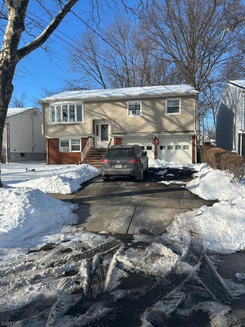WOW! SPECTACULAR!! SPACIOUS, CLASSY IN MINT CONDITION PROPERTY FEATURING LARGE LIVING ROOM, FORMAL DINING ROOM, BEAUTIFUL EAT-IN KITCHEN, 5 EXTRA LARGE BEDROOMS, 2 FULL NEW BATHS, A HUGE FAMILY ROOM, PARK-LIKE YARD, 2 CAR GARAGE, CENTRAL IAR AND HEAT, LOCATED IN A DEAD-END STREET CLOSE TO SCHOOLS, SUPERMARKET, BUS TO NY AND MUCH, MUCH MORE. HURRY, WILL NOT LAST!!!!