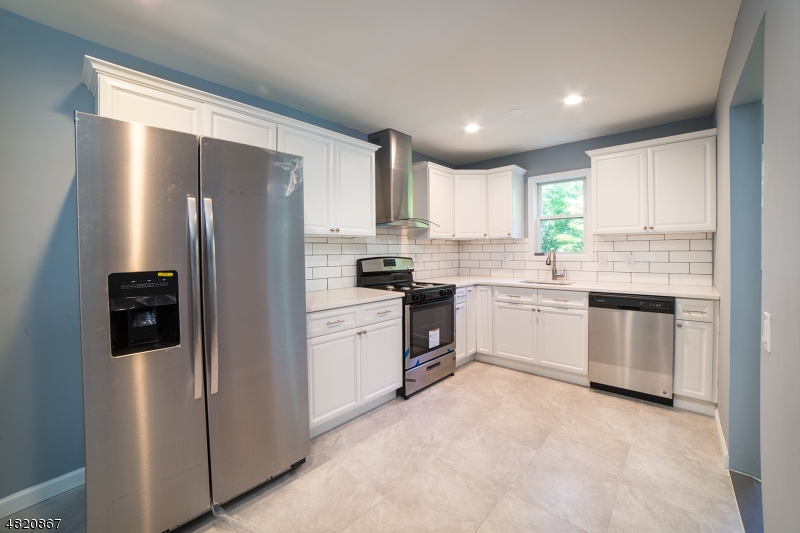 Beautifully Fully Renovated 2 Bed 2 Full Bath  move in ready Cape Cod in desireable Cozy Lake section of Jefferson Township Fully Finished basement, Gleaming hardwood floors, granite countertops, recessed lighting and much much more.  This home is a nature lovers dream come true.