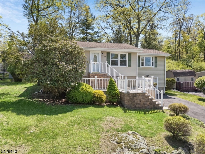 Welcome to this charming ranch located in beautiful Hopatcong. This home offers 2 - 3 bedrooms and 1 1/2 bathrooms.  The versatile den is currently being used as the 3rd bedroom. The spacious living room is ideal for entertaining, and exits onto a large deck. The large backyard is perfect for outdoor gatherings and has partial fencing.  Also featured is a full basement with a partially finished area, and a large 1 car garage with plenty of storage area.  Don't miss this wonderful opportunity in aquiet, friendly neighborhood.