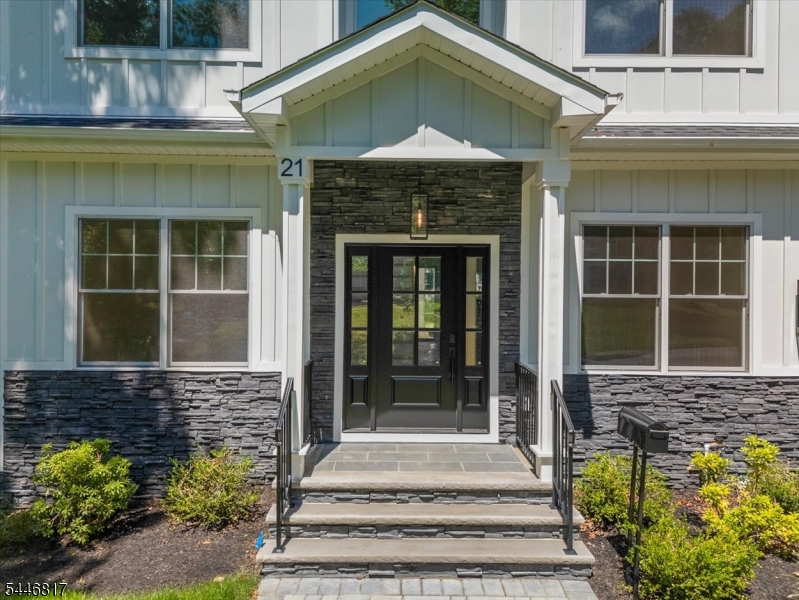 Exceptional new construction offering over 3,700 sq. ft. of beautifully finished living space across three levels in one of Livingston's most desirable neighborhoods. Situated on an approximately 8,500 sq. ft. lot, this thoughtfully designed home features 6 bedrooms, 5 full baths, and 1 half bath, blending luxury finishes with exceptional functionality. The first floor offers the flexibility today's buyers are looking for with a private en-suite bedroom, dedicated home office, formal dining room, powder room, and an expansive open-concept living area. At the heart of the home is a stunning chef's kitchen featuring premium Bertazzoni stainless steel appliances, custom cabinetry, and elegant finishes that flow seamlessly into the family room, making it ideal for both everyday living and entertaining. Upstairs, you'll find four spacious bedrooms, including a luxurious primary suite with a spa-inspired bath and an oversized walk-in closet. The fully finished basement expands the living space with an additional bedroom, full bath, wet bar, and versatile recreation area perfect for a media room, home gym, playroom, or guest suite. Thoughtfully crafted with quality workmanship and designed for modern living, this home also includes a 10-year builder's warranty for added peace of mind. Conveniently located near Livingston's top-rated schools, parks, shopping, dining, and NYC transportation, this exceptional home offers the perfect combination of luxury, comfort, and convenience.