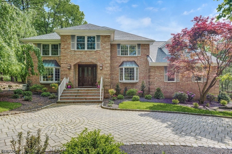 Most desired section of Montville! Sophistication meets stylish comfort! Gourmet kitch, open flr plan. BRAND NEW boiler for 6-zone BB heating, pool heater; NEWER roof.  Gorgeous pool/landscaping Paver, circular driveway lined with LED timed lights welcomes you to this home that presents a unique opportunity for the discerning buyer.  Renovated chef's kitchen has a wall oven, microwave and warming drawer plus Dacor 6 burner range, built-in refrigerator, pantry with pull out drawers, ample cabinet space, Miele steamer, tile backsplash, under the counter lighting and recessed outlets.  Open FR has bay window (new), crown molding and hardwood floors.  Adjoining LR is adorned with coffered ceiling, gas fireplace and new carpeting.  Lrg mstr BR w/sit rm/closet.  New fin bsmnt w/wet bar and full bath.