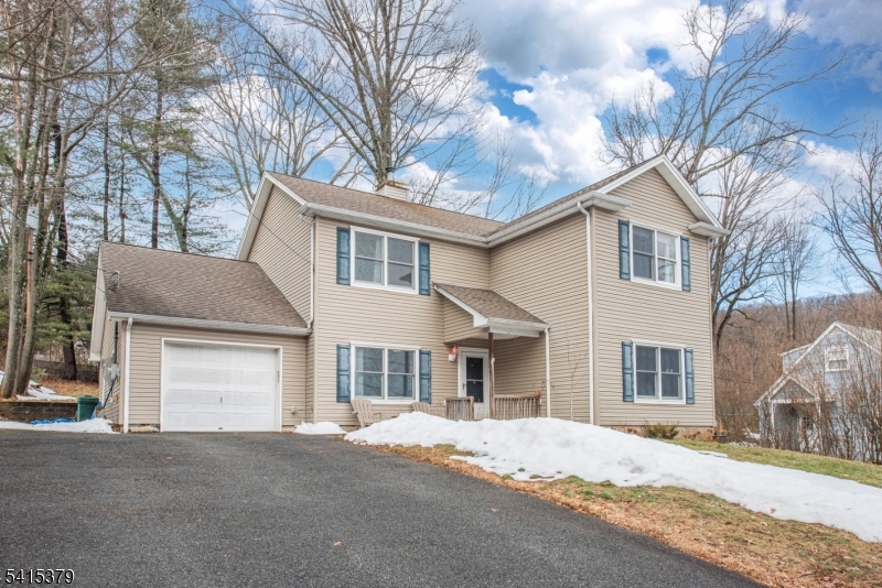 Located in Denville's desirable Beacon Hill neighborhood, just minutes from the Denville NJ Transit train station, vibrant downtown Denville, and major highways, this home offers an exceptional opportunity in one of Morris County's most sought-after communities. Enjoy the charm of this historic neighborhood while being within easy reach of local restaurants, shops, parks, and even nearby farm stores offering fresh eggs and sourdough bread. The home features a flexible layout with generous first floor living space, including a bright living room, dedicated home office, and a kitchen with plenty of room for everyday living and entertaining. Upstairs you'll find four bedrooms and a large Jack-and-Jill style full bathroom, providing comfortable accommodations and great functionality. Additional storage is available with a pull-down attic, while the one-car garage offers extra storage space and includes the laundry area. Recent updates include a newer above-ground oil tank and central air conditioning. The home is connected to public utilities, with natural gas available on the street for future conversion. The previous underground oil tank was professionally removed with permits and soil testing confirmed clean. The second-floor addition was completed in 2004 with proper permits. With its east-facing orientation, prime location, top-rated Denville schools, and strong neighborhood appeal, this property offers a wonderful opportunity to move in and make it your own.