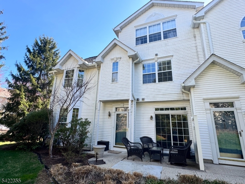 Take a look at this beautifully updated, freshly painted,light and bright end unit (Chelsea model) with new carpet. This 2 br 2.1 bath town home has a finished basement and large private patio in one of the best locations in Rose Arbor. The Primary bedroom en-suite is a true sanctuary with vaulted ceiling, large organized walk-in closet, wood floors and spa like primary bath with walk in shower and dual sink vanity. The second bedroom also has en-suite bath with a walk-in closet  and wood floors.  The laundry room is conveniently located on the second floor.. The newer kitchen boasts a  large center island with storage, stainless appliances, custom built pantry with birch shelves and access to the  private pataio. Additional feautures include programmable thermostat, 240 V Outlet for EV car charging, and heat controlled window film. The finished basement includes storage with a cedar closet and a large playroom/office/or gym. Rose Arbor is close to shopping, restaurants, train, and Routes 10, 24, 287, yet tucked away in a quiet neighborhood. Just unpack your bags and move in.