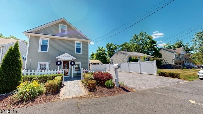 Historic Charm, Modern Luxury: Exquisite 1895 Fully Remodeled Colonial. Tucked away on a peaceful dead-end street, this remarkable home has been completely transformed w/ exceptional craftsmanship & no expense spared. Blending timeless character with modern sophistication, this move-in-ready residence offers the best of both worlds. Extensive updates include newer electrical, HVAC, hot water heater, siding, flooring, and an approximately 11-year-old roof, providing peace of mind for years to come. Rich hardwood floors flow throughout the home, creating warmth and elegance in every room.The stunning gourmet kitchen is designed for both everyday living and entertaining, featuring premium Porcelanosa cabinetry and finishes, quartz countertops, a farmhouse sink, and ample workspace for preparing memorable meals. The luxurious bathrooms are equally impressive, showcasing Porcelanosa products, floating vanities, and smart illuminated vanity mirrors for a spa-inspired experience.The home offers three spacious bedrooms, including an expansive primary suite. One secondary bedroom features private access to a deck overlooking the beautifully maintained backyard. Outside, enjoy a gorgeous paver driveway, decorative stone hardscaping, a charming wooden pavilion, and a storage shed, creating the perfect setting for entertaining, relaxing, or enjoying outdoor living.A rare opportunity to own a beautifully restored piece of history with all the modern upgrades today's buyers desire.