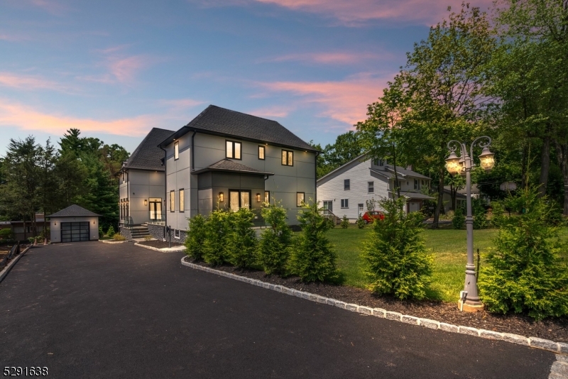 Magnificent brand-new Modern French Chateau offers an unparalleled living experience with over 8,500 square feet of meticulously designed space filled with luxury, sophistication, and top-notch craftsmanship. This stunning masterpiece was originally built for the builder's own use with no expense spared, it features high ceilings on all 4 levels! State-of-the-art designer kitn w/comm'l applncs, jaw-dropping 15ft marble waterfall island and backsplash. This home was designed for entertaining! 2nd Fl has 4 spacious bdrms, each w/lavish marble baths, custom vanities, heated floors. Primary suite has a spa-like retreat, a soaking tub, walk-in shower, dual vanities, 2 WICs. Fin'd attic w/automatic skylights, vaulted ceilings, full bath and lounge area. Full fin'd WO Bsmt is an entertainer's paradise with high ceilings, a theater, a bedroom, a gym, full bath, game/lounge rooms. The ext. features beautifully landscaped grounds, a bluestone patio w/glass railings, and rear lawn. You'll find incredible moldings and meticulous carpentry work. Situated in the sought-after Upper St. Cloud neighborhood, this property offers tranquility and convenient EZ access to top-rated schools, shops, restaurants, close prox. highways, commute to NYC. Experience the ultimate WOW factor and low taxes, priced at cost. Just a few notable features; 4 central air units, 2 EV charger hookups, house generator, automated skylights, integrated speakers throughout, heated bathroom flooring, and much much more!