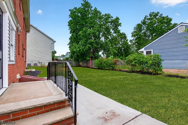 This stunning fully brick 6-Bedroom 3-Bath home with an oversized garage and fenced rear yard doesn't disappoint! Gleaming hardwood floors, cedar closets, and large rooms throughout, including 3 Mastersize bedrooms. The first floor has a bedroom, full bath, updated kitchen, formal dining-room and an expansive living-room w/ a large bay window, built-ins & fireplace with custom uplighting. Finished basement has a large recreational room, full-bath, bedroom and laundry area. 1-year Home Warranty included. Located near Rutgers, St Peters & RWJ hospitals, Rt 1, 18, 27, 287, Turnpike & Public Transportation. Seller requests approved buyers. Fireplace 'as is' and no known issues.