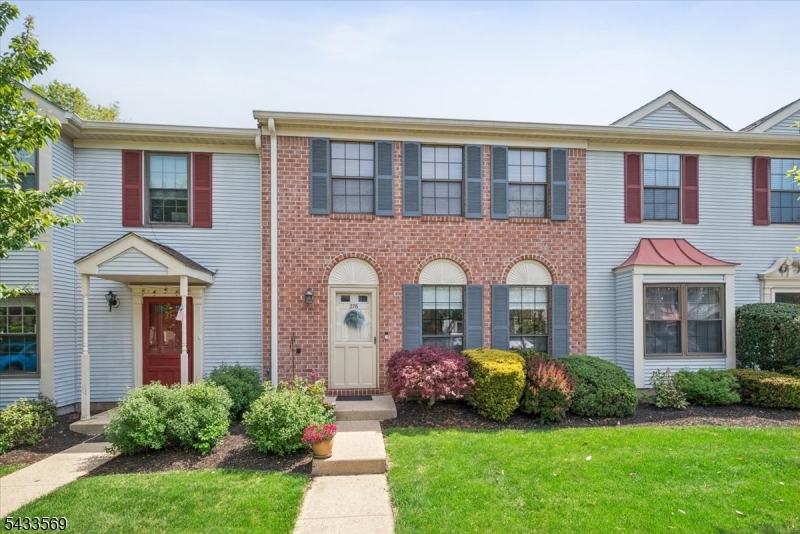 Rarely available, the 600 model offers one of the community's largest 3 bedroom, 2.1 bath floor plans with a versatile sun room and exceptional living space throughout. The eat-in kitchen features updated cabinetry, granite countertops, stainless steel appliances, tile flooring, ceiling fan, and abundant natural light. The welcoming main level also includes a formal dining area with crown molding, living room with a charming corner wood-burning brick fireplace, sunroom open to the living room, convenient powder room, oversized coat closet, and first floor utility area with updated HVAC (2022) and water heater (2018). The sunroom offers built-in shelving, two spacious closets, and two sliding glass doors leading to a semi-private patio ideal for morning coffee, outdoor dining, relaxing, grilling, or container gardening. Upstairs, the primary suite offers a spacious bedroom with two closets and a private bath with shower. Two additional bedrooms could share another full bath with tub/shower combination. Convenient second floor full-size laundry adds everyday practicality. Clean, well maintained, and offering exceptional flexibility, this home presents a wonderful opportunity to move right in and enjoy it as is, or personalize to your taste. Amenities include an outdoor pool, tennis, playground, walking paths and a clubhouse with an on-site manager. Pet friendly community. Conveniently located to I-78, I-287 and NYC Midtown Direct Trains and Buses. Top-rated school district.