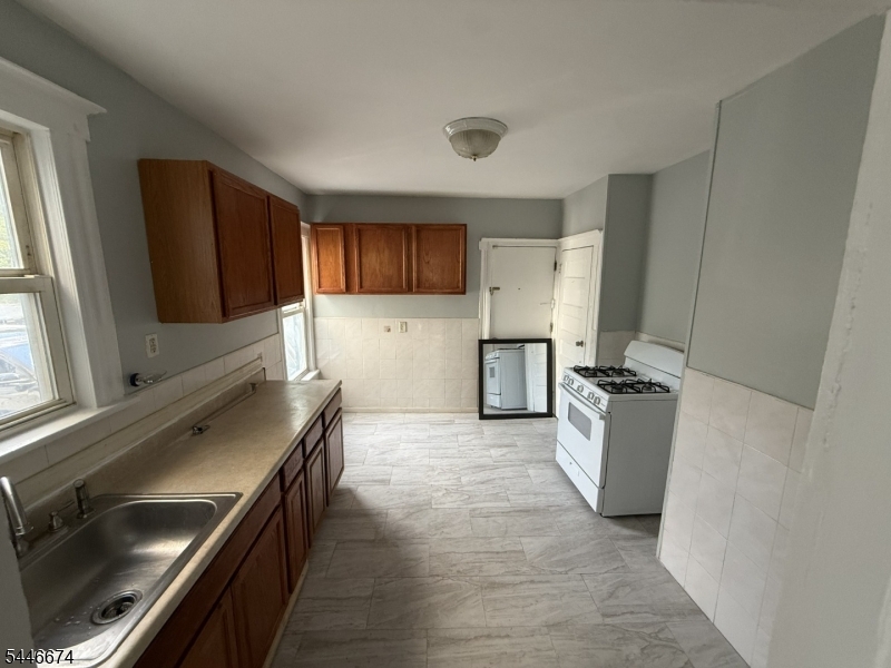 Welcome home to this spacious two-bedroom apartment featuring a comfortable and functional layout. The unit offers separate living and dining rooms, providing plenty of space for relaxing, entertaining, or working from home. Both bedrooms are generously sized, with ample natural light throughout.Conveniently located near major transportation options, this apartment makes commuting and getting around the area easy. A great opportunity for anyone seeking space, comfort, and accessibility in a well-connected location.