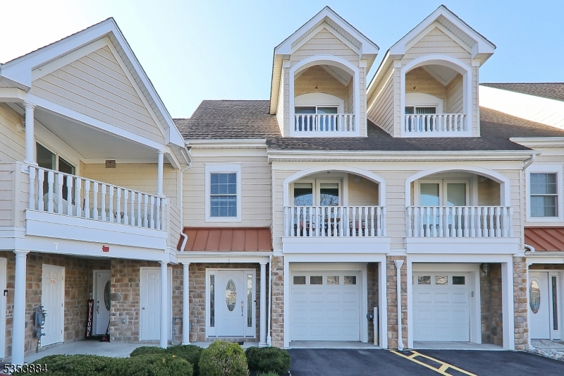 Beautiful 2 Bedroom, 2.5 Bath Townhouse with attached 1 Car Garage  located in the heart of New Providence.  Main floor: Bright Eat - Kitchen, Spacious Living / Dining Room, Powder Room and Laundry.Second Floor Primary Bedroom with Large Walk - In Closet and  Bath with Jetted Tub  and Stall Shower and Balcony.  Ground Floor Bedroom / Office with Full Bath and Sliders to Patio.Short distance to Train, Down - Town and Parks.