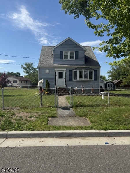 Attention investors and contractors.  Spacious cape including conforming building lot. Subdivision is the responsibility of the buyer.  Buyer must do their own due diligence  Buyer is responsible for the CO.  Buyer is responsible for all repairs.  Great location.