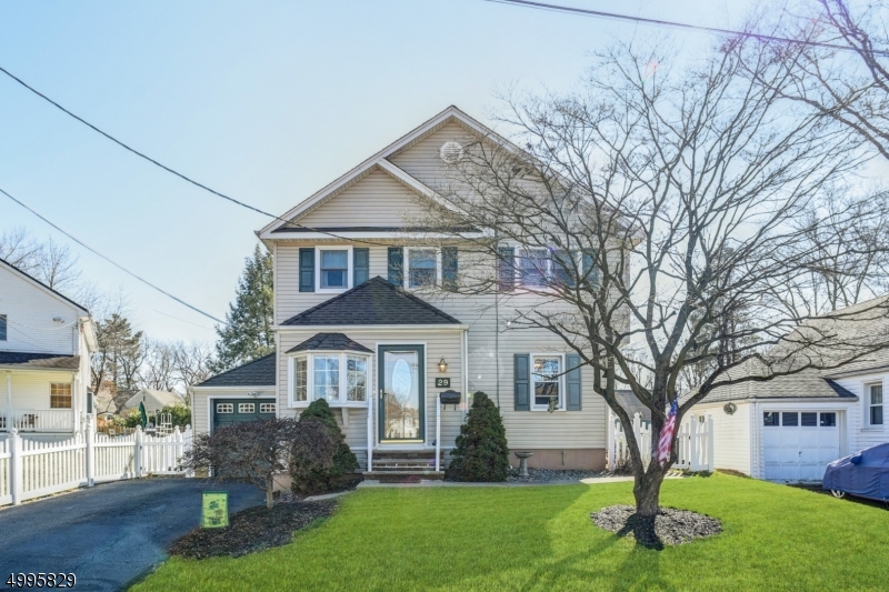 Absolutely meticulous colonial home! Upon entering, you are welcomed by warmth & abundant sunlight gleaming off the hardwood floors. The large family room is perfect for holiday gatherings. BOM! You will love the formal dining room, w/ elegant trim work & double French doors leading to oversized trex deck. The outdoor space is perfect for entertaining, w. a rare expansive fully fenced back yard. The first floor bedroom is great for guests, home office or playroom! Upstairs, the master is gracious w. a large walk in closet & direct access to shared renovated bath. Find oversized guest bedrooms w. new carpet, High basement ceilings & tons of Charm. Enjoy all Cranford has to offer w. Award Winning Downtown, Top Schools, & Easy NYC Transit! Do not miss this great find! NOT IN A FLOOD ZONE
