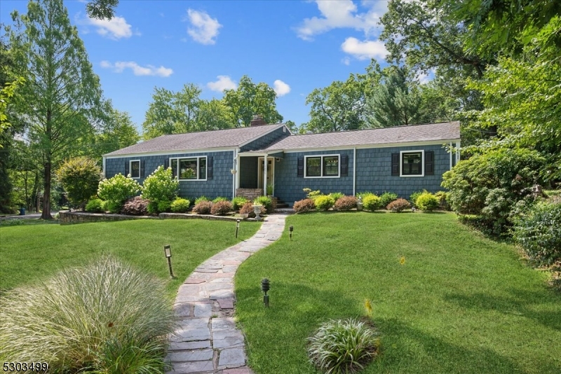 This beautifully renovated and convenient located Ranch has 3 bedrooms, 2 full baths, attached 1-car garage, central air and gorgeous finishes throughout like gleaming hardwood floors, recessed lighting and more. Well maintained corner cul-de-sac property in a quiet residential neighborhood with close proximity shopping, restaurants, golf, parks and highways. A welcoming foyer is flanked by a spacious living room with coffered ceiling and stunning wood-burning fireplace and a sprawling formal dining/family room with ample natural light. Cooking will be a joy in this updated kitchen appointed with stainless steel appliances including dual wall oven and microwave, refinished cabinetry and stunning granite counters and backsplash. The adjacent sunroom has tall windows with backyard vistas, mid-century freestanding fireplace and dual French doors to the rear-your new favorite spot for easy everyday living. Wood floors continue down the hall into 3 nicely sized bedrooms, including a peaceful primary with walk-in closet, all serviced by a full hall bath with storage vanity, soaking tub and separate shower. A second full bath with shower off the family room completes this floor, while a partially finished basement offers a sizeable rec room, laundry, utilities, storage and garage access. Enjoy summer cookouts or laying in the sun in the generous backyard with a fenced area that's perfect for keeping pets or a garden contained.  Move-in ready gem, just waiting for you to unpack.