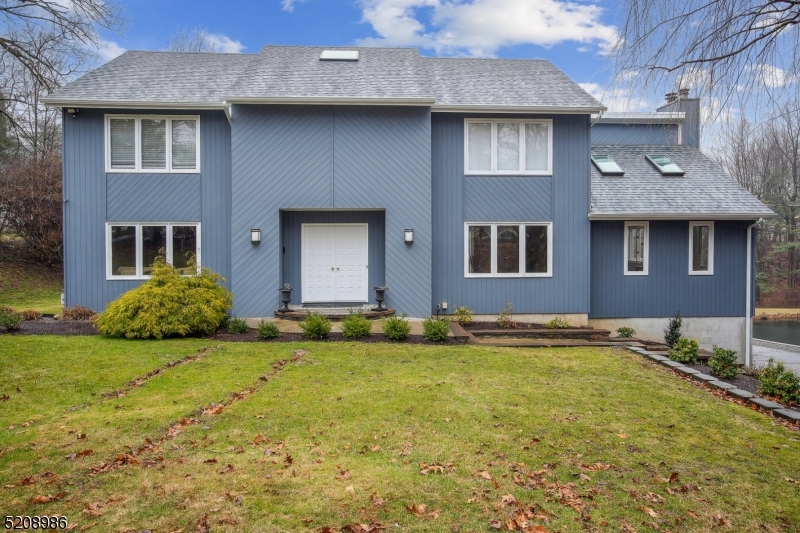 Beautiful colonial steps away from Lake Valhalla.  Updated spacious home, with natural light and privacy.  Enjoy views of the bucolic pond and backyard.  Conveniently located near the Towaco train station and easy access to 287.   With award-winning public schools, this Montville Township home is perfect for your next venture.