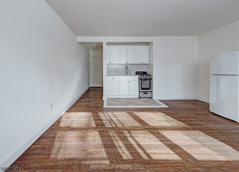 Welcome to easy, stylish living in the heart of South Orange.This beautifully renovated studio at 22 Cottage Street proves that great things really do come in smart, well-designed packages. This unit has been thoughtfully updated to balance modern style with everyday function. New hardwood floors were installed and add warmth, character, and timeless appeal. The tiled bathroom is newly renovated to feel fresh and calming. Clean lines, modern finishes, zero fuss. And the location? Hard to beat. Set in one of South Orange's most sought-after neighborhoods, You're moments from coffee shops, boutiques, dining, and the NJ Transit: everything you want, right outside your door. If you're looking for a move-in-ready studio with style, comfort, and an unbeatable location, this home is it. Make it yours.