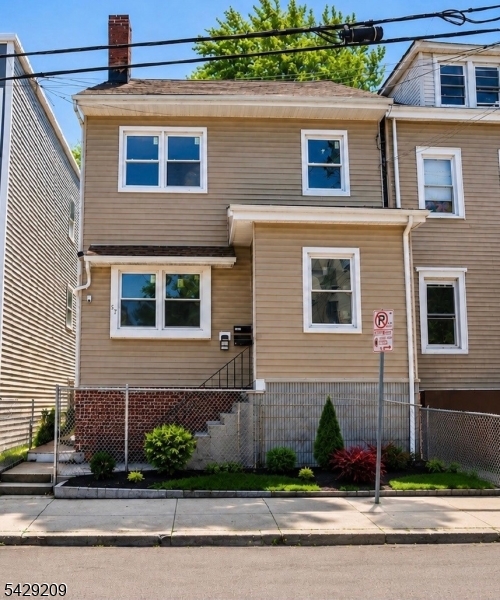 This beautifully renovated 2 family home offers modern finishes throughout, featuring a fully finished walk-out basement and an independent attic; perfect for extending living or maximizing rental income potential. Each unit boasts updated kitchens, stylish baths, and spacious layouts. 1st floor features 2 bedrooms and 2nd floor with 3 bedrooms. Private deck overlooking the backyard perfect for entertaining. Ideal for investors or owner-occupants seeking additional income. Don't miss this rare, move-in ready gem!
