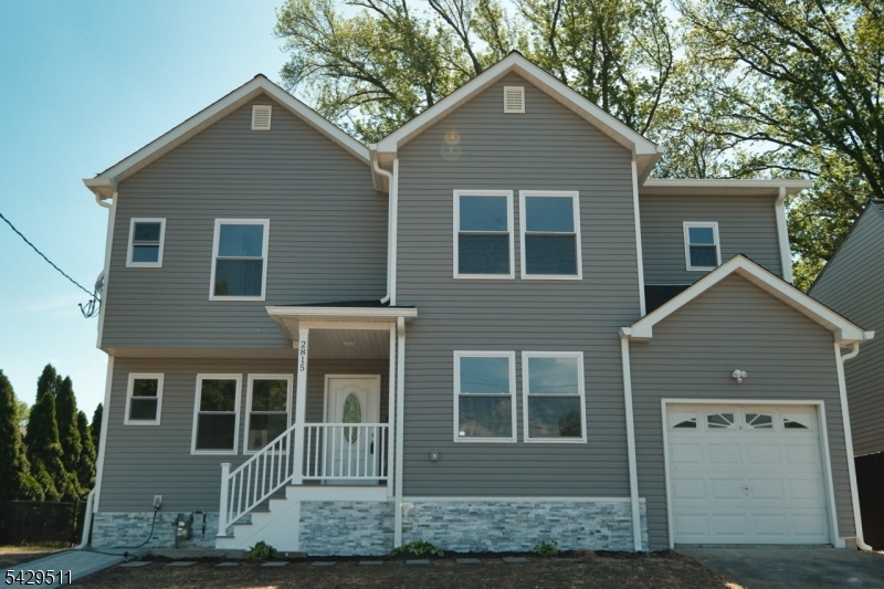 Completely rebuilt and expanded, this stunning 4-bedroom, 3-bath Cape Cod delivers approximately 3,200 sq ft of luxury-style living with designer finishes throughout. From the moment you enter, you'll notice the attention to detail featuring wide open living spaces, premium flooring, and an impressive custom kitchen with quartz countertops, soft-close cabinetry, and modern fixtures.The oversized primary suite offers a spa-inspired en-suite bath with double vanities and upscale tile finishes. Every bathroom is completely new and finished with high-end materials and contemporary design.The fully finished basement adds exceptional bonus living space perfect for recreation, guests, home office, or entertainment. Additional upgrades include central air, two-zone heating and cooling, attached garage, and private driveway.A rare turnkey opportunity offering the space and feel of new construction without the wait.