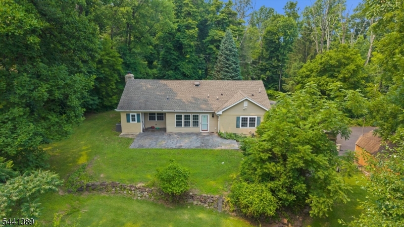Set on 1.48 picturesque acres, this beautifully updated 3 bedroom, 3 full bath ranch offers the perfect blend of modern comfort and easy one level living. Step inside and you'll immediately appreciate the warmth of gleaming hardwood floors and an open, inviting layout filled with natural light. The updated kitchen serves as the heart of the home, flowing effortlessly into the surrounding living and dining spaces, creating an ideal setting for both everyday living and entertaining. Three generously sized bedrooms provide comfortable accommodations, including a spacious primary suite designed for relaxation. The finished basement significantly expands the living space, offering endless possibilities for a recreation room, home office, fitness area, media room, or guest accommodations, complete with the convenience of a third full bath. Outside, the level property provides plenty of room to enjoy the outdoors, whether gardening, entertaining, or simply taking in the peaceful surroundings. A two car garage adds convenience and additional storage, while the desirable Holland Township location offers the tranquility of country living with easy access to nearby shopping, dining, and commuter routes. Thoughtfully updated and exceptionally maintained, this inviting ranch is ready to welcome you home.