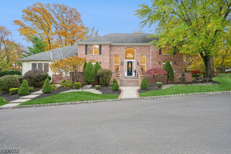 One of a kind! Nestled on prestigious Lawrence Ave on a private cul-de-sac and fully renovated in 2025, this distinguished 6 bedroom, 4.5 bath home blends scale, privacy, and modern elegance, A grand two-story foyer with dual staircases introduces the main living spaces which leads to the expansive family room featuring soaring ceilings, a fireplace, skylights, and sliding doors to a deck overlooking beautifully landscaped, resort-like grounds. The formal living and dining rooms offer refined entertaining spaces, complemented by a discreetly placed powder rm. The first-floor primary suite offers a serene retreat equipped w/a sun room, dressing rm and spa-like bath. The gourmet kit, designed for entertaining, feat stone counters, abundant cabinetry, a large pantry, dual sinks, SS appliances, a double-oven range, wall oven, microwave, and an island with seating for four. A private guest wing with its own entrance, full bath, and adjacent laundry adds comfort and convenience.Upstairs,4 generously sized bedrooms,2 full baths, and ample closets offer flexible living. A high-ceiling unfinished basement provides potential for recreation or expanded space. Additional highlights include multi-zone heating and air conditioning, hardwood floors, abundant natural light, 3 car garage, sprinkler system and generator. Located on a highly sought after Westfield location, the home offers top-rated schools, vibrant downtown dining and boutiques, NJ Transit to NYC, and nearby parks.
