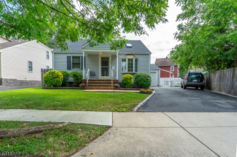 Welcome home to this immaculate 3 bed 3 bath cape cod in the desirable town of roselle park. Upon entry, greeted with a LARGE living room with custom wood beams running across the room. Gleaming hardwood floors through out the first floor with an abundance of natural light. Beyond the living room, you will find your kitchen, full bath, and two additional bedrooms completing your first floor. Upstairs you will find your master bedroom with en suite. The finished basement is equipped with a summer kitchen, den and full bath. Off the rear of the home, your new sliding door brings you onto your brand new trex's deck in your completely fenced in backyard with a paver patio below. The Roselle Park train station is .05 miles and brings you into NYC.