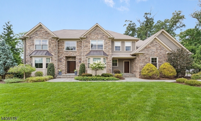 The ultimate in luxury & performance, this custom home in one of Florham Park's most desirable neighborhoods is loaded w/high-end upgrades & distinctive benefits rarely found at any price point. Approx. 7000 + sq. ft including the finished lower level & featuring 4+ spacious bedrooms and 6 baths, it also offers a separate lower-level guest suite w/full bath & direct garage access, ideal for guest or remote work space. A first-floor office, finished basement w/gym & wet bar, & a heated 3-car gar complete the flexible layout. What sets this home apart is its blend of luxury, efficiency, & wellness. Geothermal heating/cooling, fully owned solar panels, & participation in NJ's SREC program resulted in a net energy profit in 2024. Solid wood flooring & molding (no MDF), mineral wool insulation, and low-VOC finishes meet EPA Indoor airPLUS standards for healthier living. Air is continuously refreshed by a HEPA-ready ERV system, & a whole-house water filtration system removes PFAS, heavy metals, & more. Smart home wiring (Cat5e), wine refrigerators in the dining room & basement, & an instant hot/filtered water tap elevate convenience & entertaining. The kitchen features a Wolf dual-fuel range, Miele combi-steam oven, Bosch dishwasher, & KitchenAid built-in fridge. Additional highlights include radiant heat in kitchen and baths, steam shower, whole-house generator, EV plugs, motorized shades, fenced yard with fire pit, solar-equipped shed, 3 car heated garage & more!