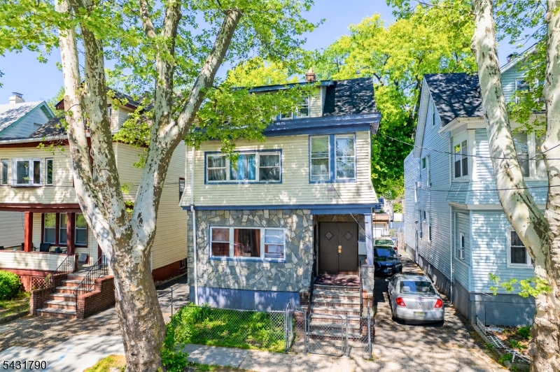 HIGHEST AND BEST DUE TUESDAY AT 5PM 05/26. income-producing opportunity awaits! This well-maintained 2-family home offers incredible flexibility and maximum earning potential for the savvy investor or owner-occupant. Unit 1 features 4 spacious bedrooms and 1 full bath with its own private entrance. Unit 2 offers 4 bedrooms and 1 full bath with a private entrance, plus a separately accessible attic level featuring 2 additional bedrooms and a full bath   offering versatile and flexible living space. Both units are move-in ready and separately accessible, making tenant turnover seamless. Potential for basement unit to be finished with full bathroom. Outside, enjoy a private driveway accommodating up to 4 vehicles plus 2 detached garages   a rare find that tenants and buyers will love. Conveniently located near multiple NJ Transit bus lines and the Irvington Bus Terminal, with easy access to Newark, NYC, and major highways. Don't miss this turnkey investment with room to grow!