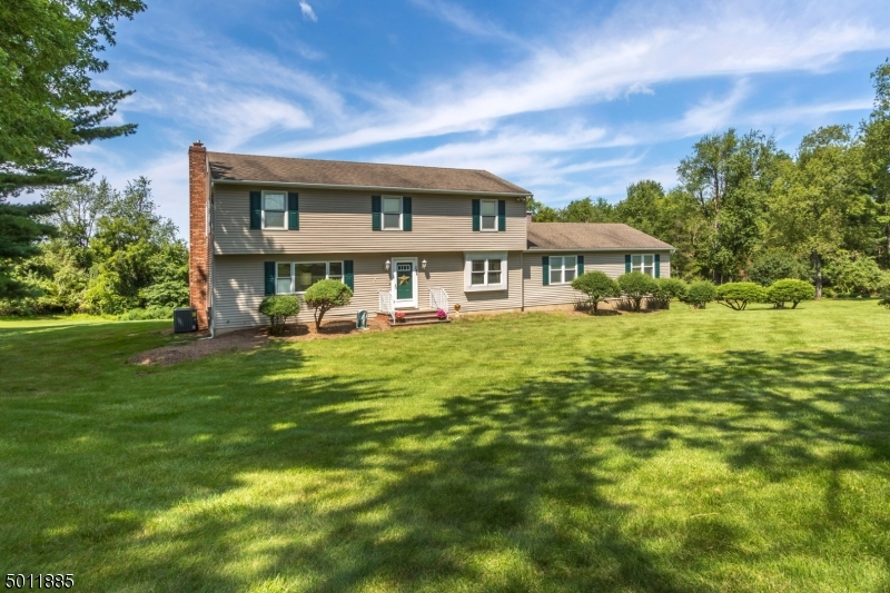 2 Homes in 1! Custom built & meticulously cared for. Featuring a Separate 2 bedroom Au-Pair suite w/private entrance & park views! Can be used as Guest Qtrs or Master Suite. 4 Lrg Bedrms in Main Home Spacious home gives residents privacy w/room to grow&entertain along with quality construction. The main house boasts 4 large bedrooms, 2 1/2 baths, living room, dining, rec room w/fireplace and kitchen. Hardwood floors throughout. The attached two car garage is an added feature. Full Dry High Ceiling Basement. The attached in law suite has a separate entrance and features 2 bedrooms, full bath, living room, and a full kitchen.  Major utilities updated & in impeccable condition.  Near White Oak Park. Don't Miss this Chance!
