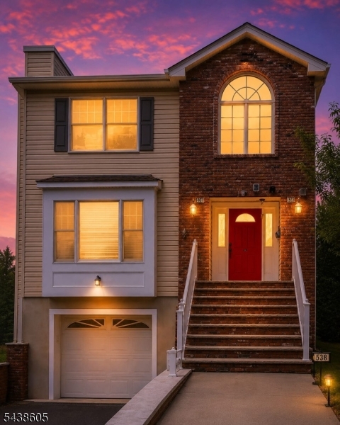 Welcome to this beautifully maintained, move-in-ready Colonial built in 2005, offering modern updates, spacious living, and a prime location. This home features 4 bedrooms, 3.5 baths, a first-floor primary suite, and a stunning kitchen renovation completed in 2025.The bright main level includes an inviting foyer, spacious living room with fireplace, formal dining room, powder room, and an updated eat-in kitchen with abundant cabinetry, storage, and backyard access perfect for entertaining and everyday living.The first-floor primary suite offers a large walk-in closet and updated private bath. Upstairs are three generously sized bedrooms, all with walk-in closets, and a recently renovated full bathroom.The fully finished basement expands the living space with impressive 12-foot ceilings, a full bath with shower, separate laundry room, gas freestanding fireplace, and versatile bonus space ideal for a home office, gym, recreation room, media room, or guest area.Additional features include hardwood floors throughout, crown molding, central air, a finished garage with direct home access, and a low-maintenance paved backyard. Conveniently located on a 40x100 lot just two blocks from NJ Transit train and bus service to NYC, plus nearby schools, parks, shopping, and dining.A rare opportunity to own a newer Colonial with three finished levels of living space in one of Union County's most commuter-friendly locations. Truly move-in ready!
