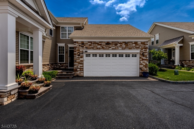 Welcome to a highly sought-after Regency at Readington, an exceptional Toll Brothers 55+ active adult community offering luxury, comfort, & a carefree lifestyle. This upgraded & beautifully maintained Raritan model end unit townhouse features: a bright, open-concept floor plan, a gourmet kitchen w/ Wolf appliances, subzero refrigerator, pot filler, extended soft close cabinetry, large center island w/ quartz counter top & pendant lighting, a sun-drenched living room w/ a gas fireplace, cathedral ceiling and classic chair rails, a dining room w/ custom tray ceiling, bedrooms w/ custom walk-in closets, spa-like bathrooms & a beautifully finished basement for all of your entertaining needs. This home includes a whole-house backup generator- an exceptional upgrade that offers reliability, security & continuous power during storms and unexpected outages. Outside, features a large deck w/ a gas hook-up & a large patio.. This townhouse has way too many upgrades to list! Take advantage of the community's outstanding amenities, including a clubhouse, fitness center, clubhouse pool, bocci courts, walking paths, and a full calendar of social activities. Lawn care & snow removal are included, allowing you to enjoy a true low-maintenance lifestyle. Ideally located in scenic Hunterdon County, this home is just minutes from shopping, dining, golf courses, major highways, & commuter routes. Experience the perfect combination of luxury, convenience, & active adult living.