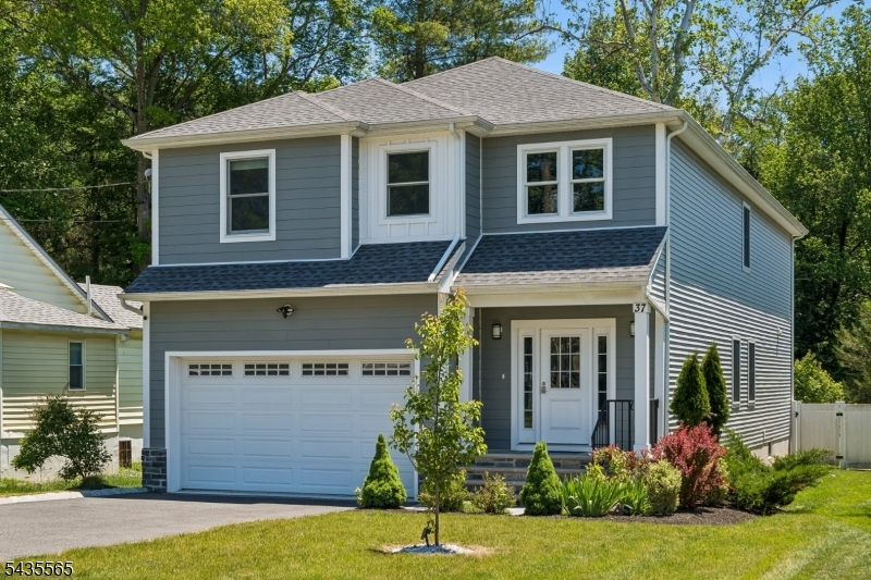 HGTV inspired NEWER Construction 5 Bed + 5.1 Bath COLONIAL boasts OVER 3000 sq ft of Living Space on 1st and 2nd levels + Full FINISHED 9 Ft Basement. Main Level OPEN floor plan features BRIGHT & CHIC Eat-In Kitchen with SS Appliances, MODERN Quartz WATERFALL ISLAND and SLIDER to PATIO overlooking a LEVEL & COMPLETELY PRIVATE Backyard. Second Floor hosts a LUXURIOUS Primary Suite with Full SPA Like Bath and LARGE WIC + 3 Additional Bedrooms (incl. an En-Suite), 2 Full Bathrooms and a convenient Laundry Room. Basement offers a Bedroom/Bonus Room, Full Bath and a Spacious REC Room. Hardwood Floors and Recessed Lighting throughout. The entire home was freshly painted in June 2026. Top-Rated Schools, NYC Bus, Shopping, and Restaurants are all AROUND THE CORNER. MOVE RIGHT IN and ENJOY LIFE in PRESTIGIOUS Livingston!