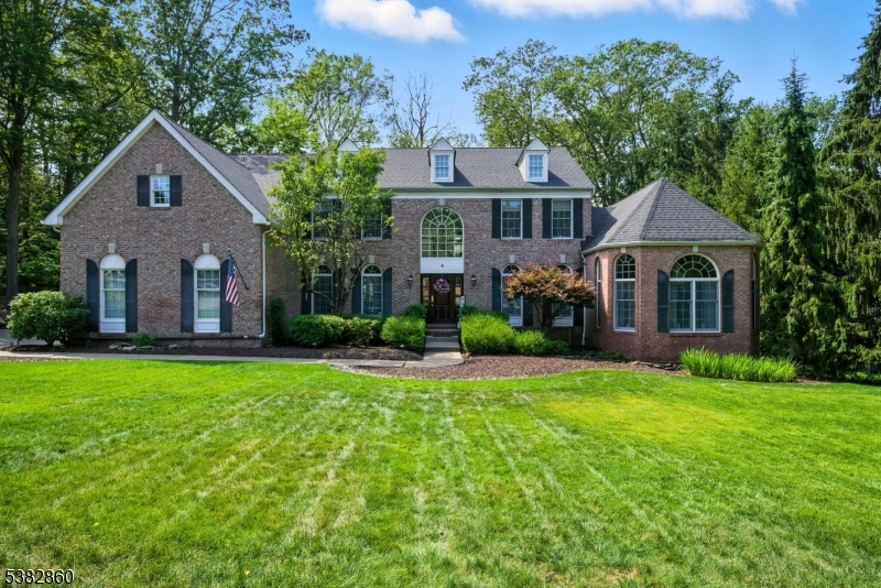 SPECTACULAR Colonial w/gorgeous, renovated kitchen designed for the discerning chef. Perfect for entertaining w/ oversized center island, granite, Kitchen-Aid appliances, new Bosch dishwasher; open to family room w/soaring ceilings, skylights, fireplace. Newer GREAT Room features high ceilings, stunning floor to ceiling windows, magnificent mahogany built-in w/media system, wet bar & wine fridge, sound proofed w/pocket door. Office equipped w/handsome built-in, window seat & 2 sets of French doors. Classic living & dining areas, lots of natural light. Hardwood flooring. Main floor laundry/mud rm off 3 car garage. Backyard will absolutely take your breath away! Charming paver/bluestone patio w/lots of landscaping & fencing to create a private oasis. 2nd level offers 4 well-appointed bdrms. Primary suite features sitting room, 2 walk-in closets, private bath w/ jet tub & stall shower. 3 more generously sized bedrooms & full bath.  Bright open hallway. Dry unfinished basement provides a ton of storage & potential space for exercise, wine cellar etc. Decorators dream w/ paint colors, decor, molding, striking mahogany front door & A+ curb appeal. This home has been well loved & it shows from top to bottom. New Roof 2024, Extended & Widened Driveway. Level lot on cul-de-sac. Toll Brother Cedarbrook Federal Model. Public Utilities. Excellent School System w/nearby private school options. Local shopping, parks, restaurants & easy NYC commute by bus, train, hwy. Don't miss this one!