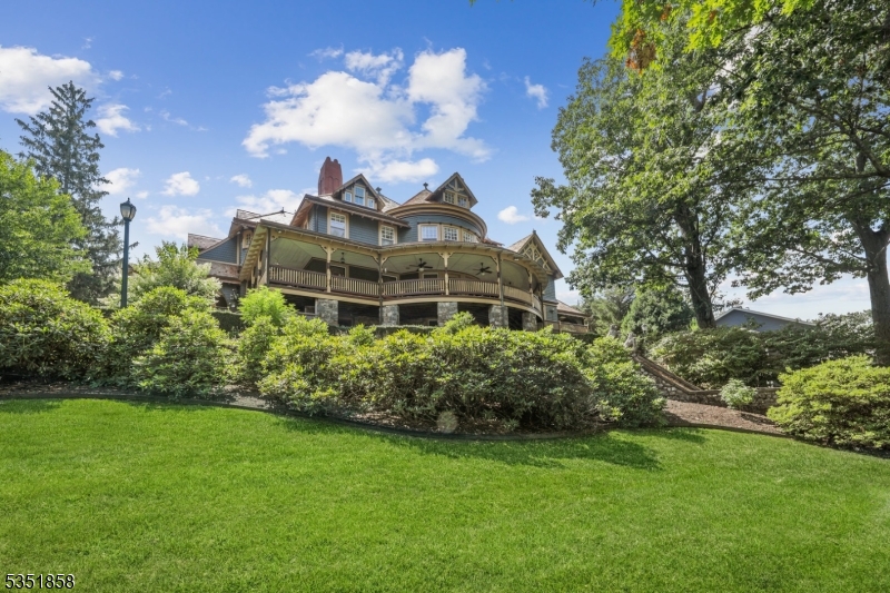 Fabulous Laketastic opportunity to purchase one of the most prestigious waterfront homes on Lake Hopatcong, Lotta Crabtree's Historic Estate! Lotta Crabtree was the most celebrated actress in America during the California gold rush and used this grand manor as her summer residence near Hotel Breslin. Architect Frank Furness designed this beautiful Queen Anne style home set on almost an acre and surrounded by manicured landscape. This magnificent estate is an architectural masterpiece! The 18 room mansion features: a circular driveway, a charmingly foyer, carved stairway, dining room, billiard room, 9 beautiful granite fireplaces and sweeping verandas. Within the hallways, stairways and some bedrooms there are original stained-glass windows that beam vibrant colors into the home. There are 8 Bedrooms, and 2 full 2 half baths that combine exquisite details such as: custom woodwork, moldings, coffered ceilings and hardwood floors. Amazing 2000 sqft verandas overlooking the lake w/ custom designed furniture. A gorgeous gourmet kitchen with separate eating area, and an adjoining family room add to the ambiance of this majestic beauty. The grand fireplaces, chimneys and flues are "as is condition, there are no known issues. The dock area 150ft of waterfront with a cabana. This home has been beautifully renovated over the years while staying true to its history. Don't miss this RARE opportunity to own this regal residence!