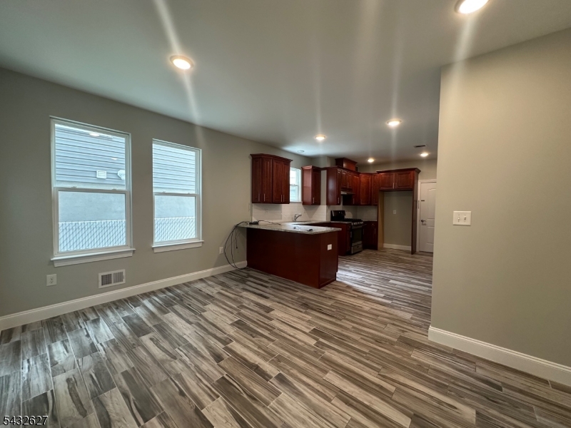 Welcome to this beautifully updated 2-bedroom apartment nestled in one of Newark's most desirable neighborhoods, just moments from the iconic Branch Brook Park ? home to the largest cherry blossom collection in the United States.This thoughtfully designed unit features modern finishes throughout, offering the perfect blend of style and comfort. From the moment you walk in, you'll appreciate the attention to detail and quality upgrades that set this apartment apart from the rest.