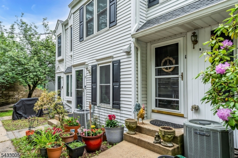 Welcome to this well-maintained townhome in the heart of High Bridge! Offering 2 beds, 1.5 baths, and an attached garage. Just moments from the Columbia Trail and Ken Lockwood Gorge, with Lake Solitude Waterfalls within walking distance, truly like having it in your own backyard. Additionally, two reservoirs are located less than 10 minutes away. The main living level features a bright and inviting layout with a spacious living room, dining area, kitchen, and convenient half bath. Warm updated flooring and natural light create a comfortable atmosphere throughout the main floor. The kitchen offers abundant cabinet storage, granite countertops, gas cooking, and included appliances such as a dishwasher, microwave, and refrigerator. Upstairs, you'll find two generously sized bedrooms with ample closet space and a full bath. Primary bedroom is bright and airy with large windows overlooking beautiful greenery. The ground level includes utilities, laundry area, and direct access to the attached garage. Additional highlights include central air, forced hot air heating, public water and sewer, vinyl siding with brick accents, and a recently replaced roof. Open parking for additional vehicles. Enjoy low-maintenance townhouse living while being conveniently located near localshops, restaurants, parks, and commuter routes. Whether you're looking for your first home, downsizing, or seeking an investment opportunity, this charmingHigh Bridge townhouse is ready to welcome its next owner!