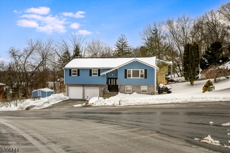 Move-in ready Bi-level in desirable hill section of Boonton. NEW ROOF! Beautifully maintained 4 bedroom, 2.5 bath home on quiet Ross Drive. Features a spacious primary suite with walk- in closet, updated 2026 kitchen with stainless steel appliances, hardwood floors, central air, heated garage, overhead lighting, and abundant natural light throughout. Lower level offers walk-out access to patio and a two car garage. Convenient to Main Street shops, restaurants, parks, Lakeland Bus, and Morristown-Boonton train line. Move right in and enjoy! Small town BIG heart!