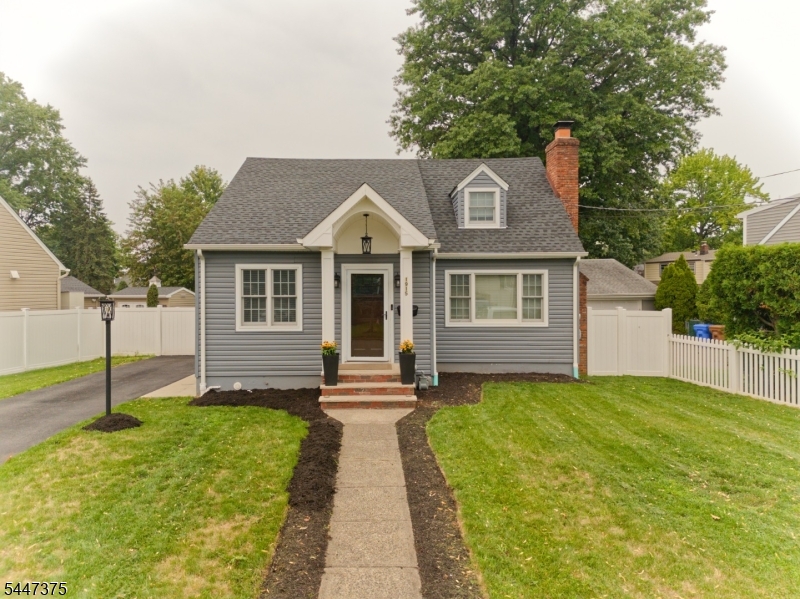Welcome to this stunning, move-in-ready Cape Cod located in the highly sought-after Sunnyside section of Linden. This beautifully updated three-bedroom, two-bathroom home blends timeless charm with modern finishes, offering the perfect balance of style, comfort, and functionality.The sun-filled eat-in kitchen features elegant finishes and opens seamlessly to the spacious living and dining areas, creating an inviting open-concept layout that's perfect for everyday living and entertaining.The expansive walkout basement boasts high ceilings, abundant storage, and endless possibilities. Whether you envision a home theater, fitness studio, home office, recreation room, or additional living space, this versatile area is ready to suit your lifestyle.Step outside through the dining room to a private backyard oasis featuring a spacious patio ideal for outdoor dining, summer barbecues, gardening, or simply relaxing. A white privacy fence fully encloses the yard, providing both security and tranquility.Conveniently located near major highways, shopping, restaurants, parks, schools, and public transportation, this exceptional home offers the perfect combination of suburban charm and commuter convenience. Don't miss your opportunity to own this beautiful Sunnyside gem.