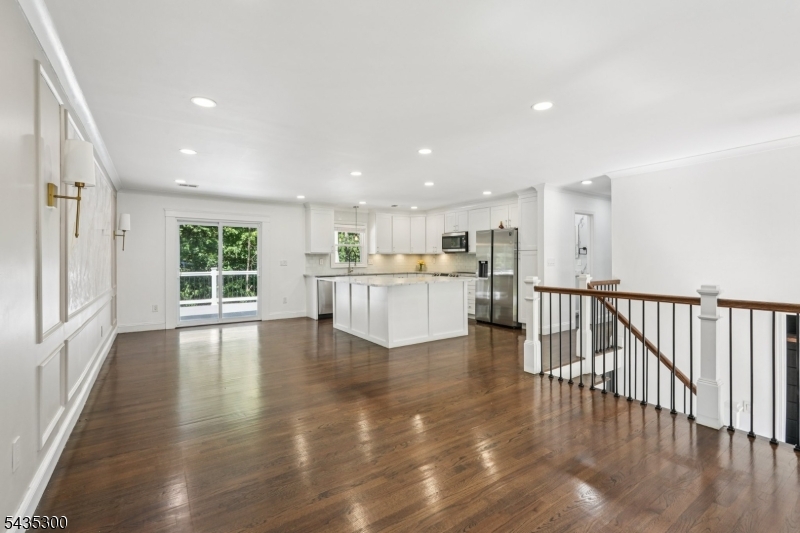 Welcome to your dream home in the heart of Hopatcong! This stunning 4-bedroom, 3-bath residence blends timeless charm with modern updates. Step inside to find an open-concept layout flooded with natural light, hardwood floors throughout, a sleek, updated kitchen, brand new septic system, and spa-like bathrooms that feel straight out of the magazine.