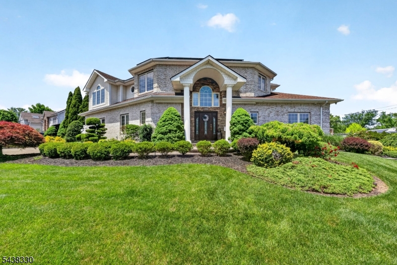 Welcome to this exceptional custom-built 5-bedroom home, perfectly situated on a beautifully landscaped corner lot. Designed with luxury, comfort, and functionality in mind, this residence offers high-end finishes, premium mechanical systems, energy-efficient features, and resort-style outdoor living.Step inside to find radiant heated floors throughout the entire first level and a stunning custom kitchen featuring premium cabinetry, a 48-inch KitchenAid refrigerator, and a spacious butlers pantry. The expansive great room is filled with natural light from Pella windows with built-in blinds and anchored by a cozy fireplace, creating the perfect gathering space.Built for efficiency and convenience, the home includes owned solar panels, a high-efficiency hot water boiler, two-zone heating and cooling, central vacuum, a whole-house generator, security cameras, and a cedar closet.The flexible floor plan offers five spacious bedrooms, including two conveniently located on the first floor, providing versatility for guests, a home office, fitness room, or other lifestyle needs. Outside, enjoy your own private retreat with a heated in-ground concrete pool, professionally maintained landscaping, and two storage sheds. Two separate driveways provide ample parking and added convenience.Combining timeless craftsmanship, thoughtful design, premium mech. systems, and modern amenities, this remarkable home delivers an unparalleled living experience in a setting that truly stands out.