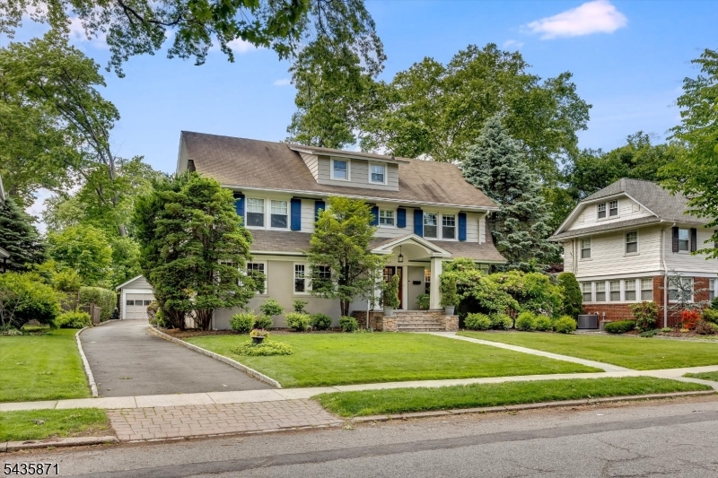 Set on one of Glen Ridge's most desirable tree-lined streets, this beautifully maintained Center Hall Colonial offers 6 bedrooms, 3 full and 2 half baths, combining timeless architectural charm with the space, comfort, and functionality sought by today's discerning renters. A gracious foyer welcomes you into generously scaled living spaces, including a sun-filled living room with fireplace, formal dining room, and inviting family room, creating an ideal layout for entertaining and everyday living. The spacious eat-in kitchen offers abundant cabinetry, ample counter space, high end appliances, and French doors leading to a large deck overlooking the private, deep backyard. A screened porch and powder room complete the first floor.The second level features four spacious bedrooms, including a primary suite with updated bath, along with an additional full hall bath. The third floor provides two additional bedrooms and a full bath, offering excellent flexibility for guests, home offices, or recreation space. The finished lower level with powder room adds valuable living space perfect for a playroom, media room, gym, or work-from-home setup. Ideally positioned near beautiful parks, gas-lit streets, and the Glen Ridge jitney, which provides easy access to the Midtown Direct train service, this home offers the rare combination of space, convenience, and community. A wonderful opportunity for those relocating, renovating, or seeking to experience the exceptional Glen Ridge lifestyle.